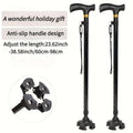 Pair of adjustable black quad canes with T-handle, wrist strap and four-point anti-slip rubber base, 60-98 cm